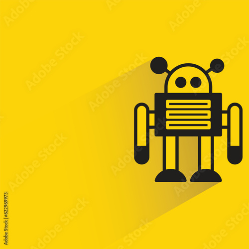 cute robot with shadow on yellow background