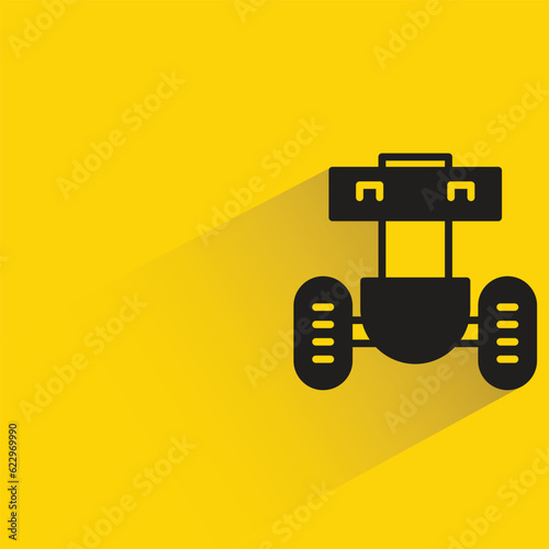 cute robot with shadow on yellow background