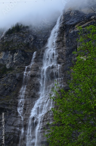 Low angle view of beautiful waterfall in mountains
