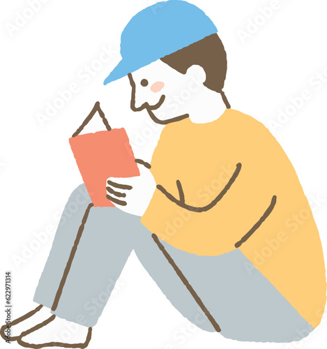 体育座りをして本を読む男性_色