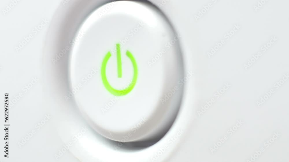 Pushing Power Button close up shot Pushing Power Button close up shot