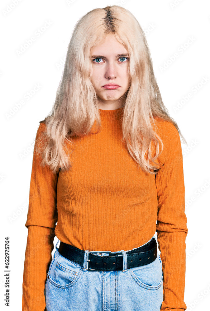 Young caucasian woman wearing casual clothes depressed and worry for distress, crying angry and afraid. sad expression.