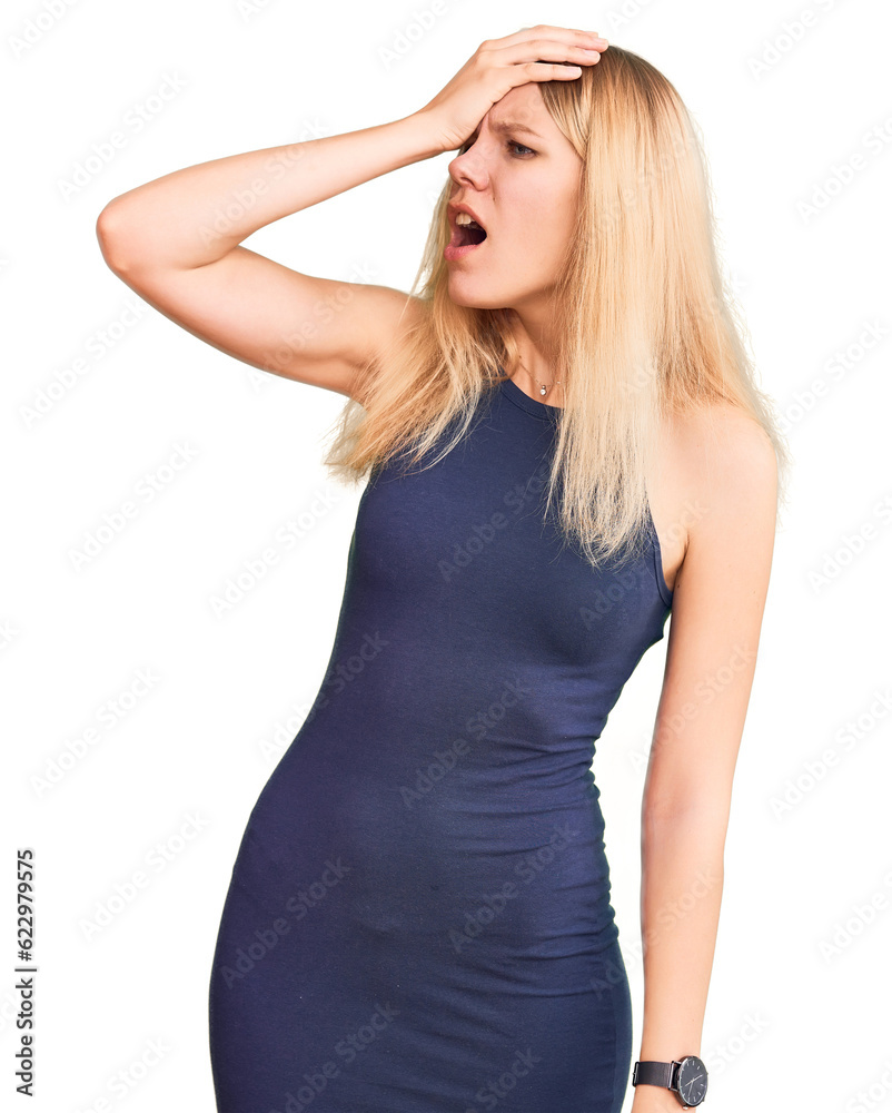 Young beautiful blonde woman wearing casual dress surprised with hand on head for mistake, remember error. forgot, bad memory concept. Young beautiful blonde woman wearing casual dress surprised with hand on head for mistake, remember error. forgot, bad memory concept.