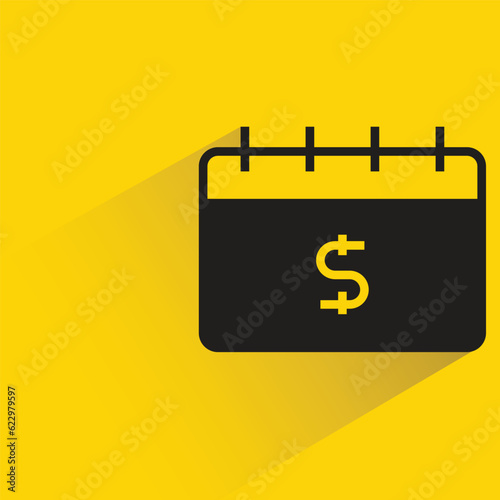 payment date calendar with shadow on yellow background
