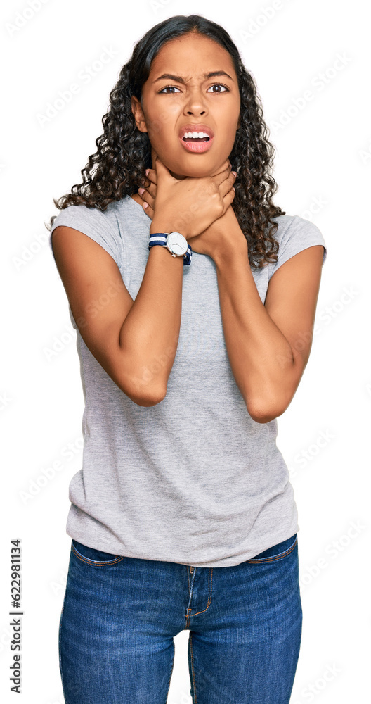 Young african american girl wearing casual clothes shouting suffocate because painful strangle. health problem. asphyxiate and suicide concept.