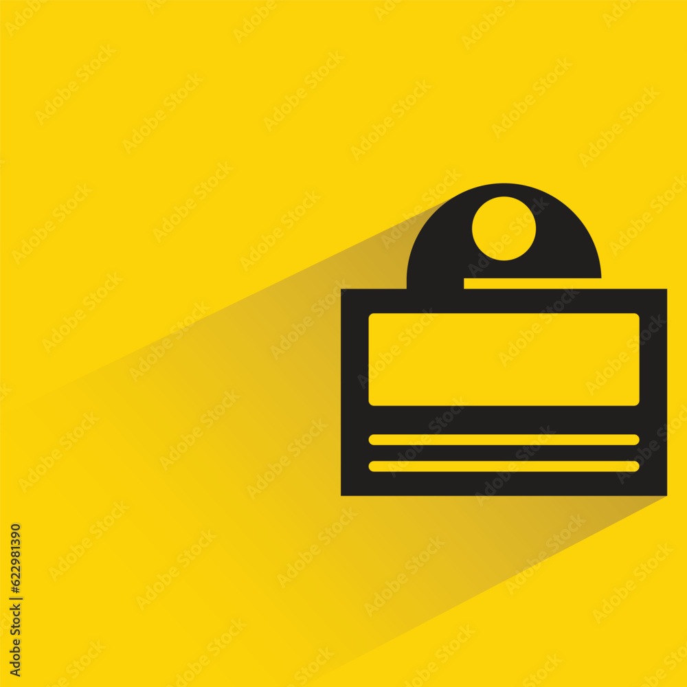 id card badge with shadow on yellow background id card badge with shadow on yellow background