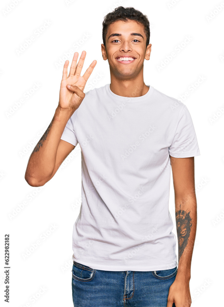 Young handsome african american man wearing casual white tshirt showing and pointing up with fingers number four while smiling confident and happy. Young handsome african american man wearing casual white tshirt showing and pointing up with fingers number four while smiling confident and happy.