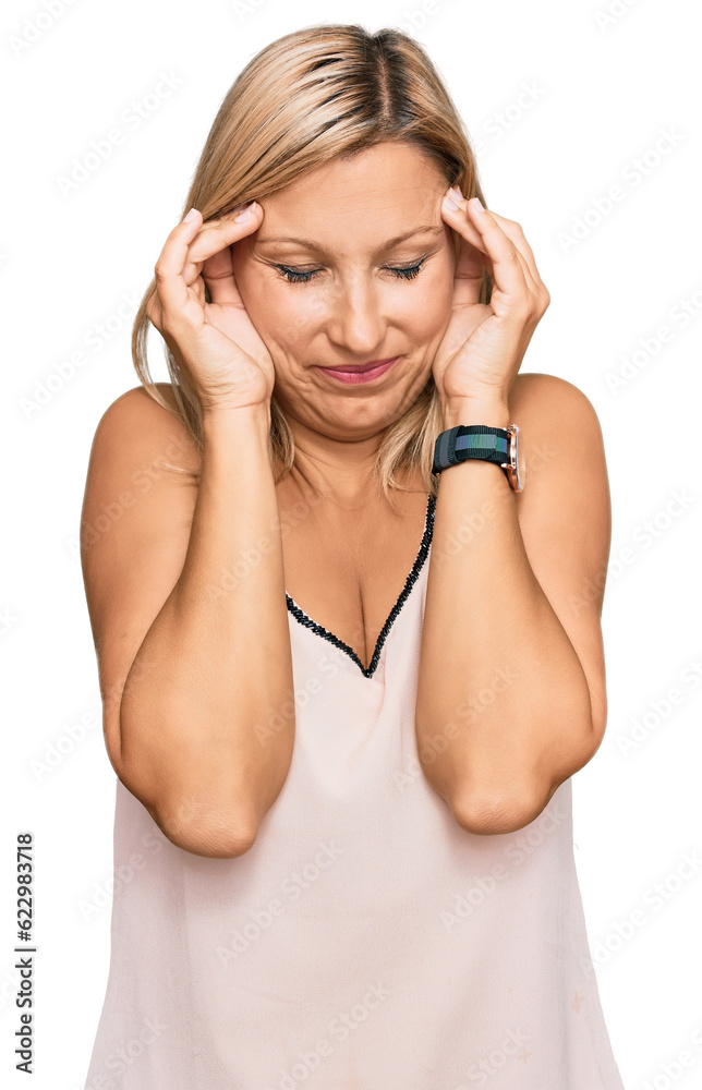 Middle age caucasian woman wearing casual clothes with hand on head, headache because stress. suffering migraine. Middle age caucasian woman wearing casual clothes with hand on head, headache because stress. suffering migraine.