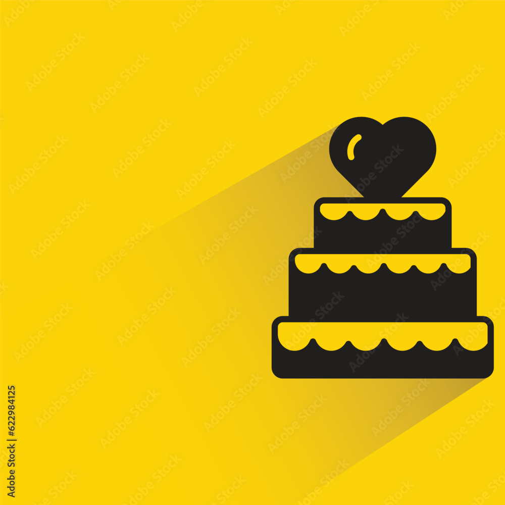wedding cake with shadow on yellow background wedding cake with shadow on yellow background