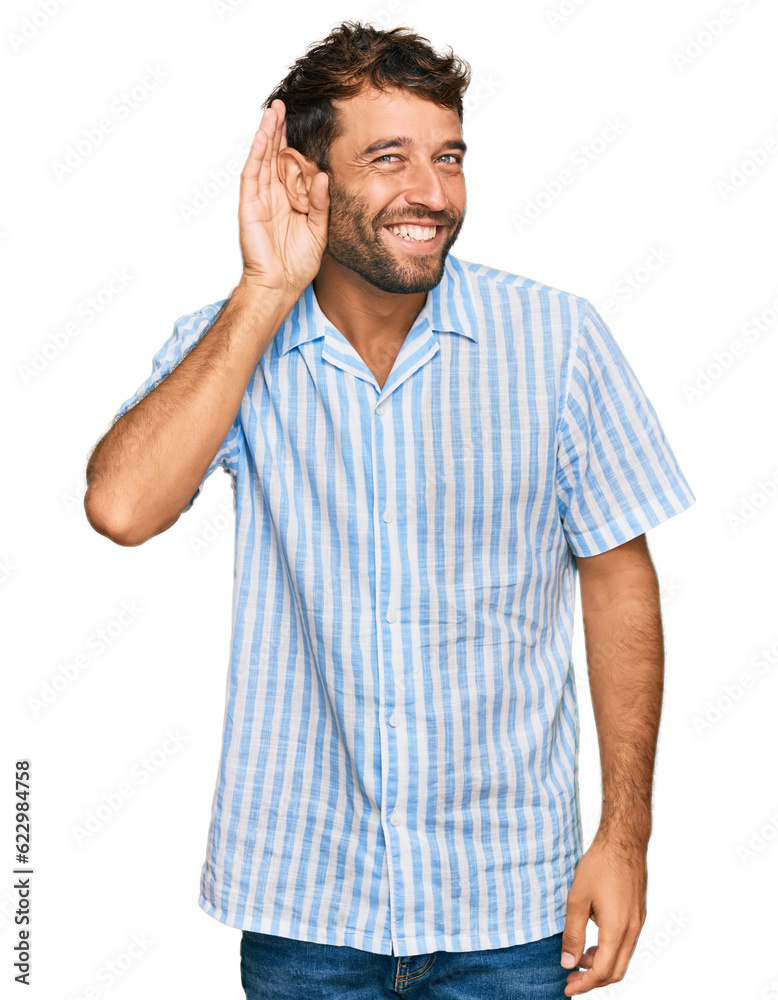 Handsome young man with beard wearing casual fresh shirt smiling with hand over ear listening an hearing to rumor or gossip. deafness concept. Handsome young man with beard wearing casual fresh shirt smiling with hand over ear listening an hearing to rumor or gossip. deafness concept.