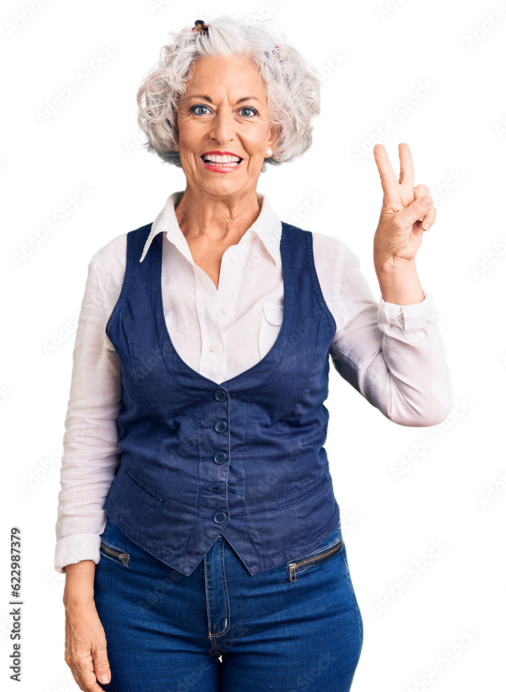 Senior grey-haired woman wearing casual clothes smiling with happy face winking at the camera doing victory sign. number two. Senior grey-haired woman wearing casual clothes smiling with happy face winking at the camera doing victory sign. number two.
