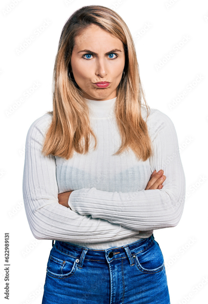 Fototapeta premium Young blonde woman with arms crossed gesture depressed and worry for distress, crying angry and afraid. sad expression.