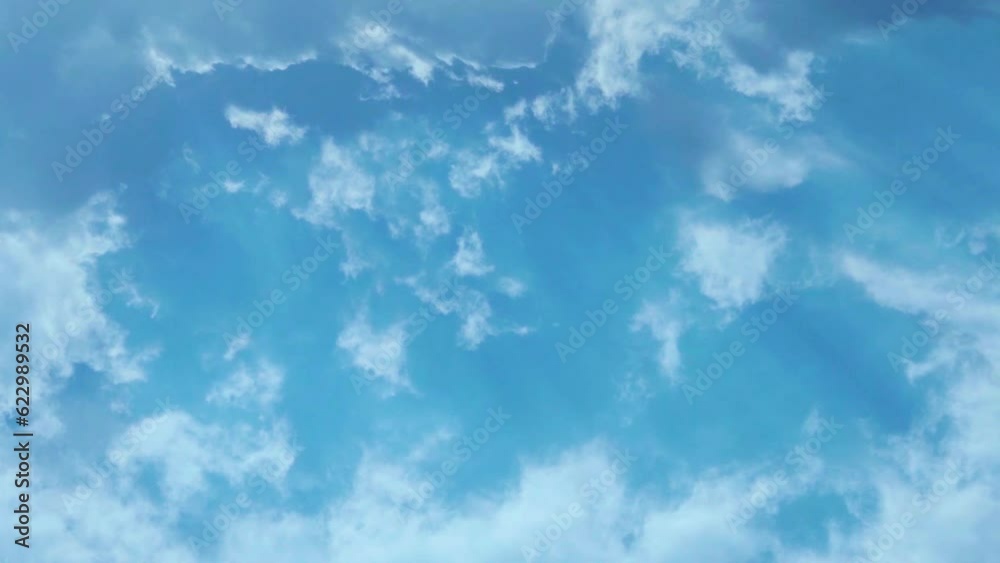 White Clouds in Sunlight Blue Sky, Time Lapse, Aerial Drone View, Air Plane Window View. Azure Skyscraper and White Fluffy Clouds in Sun Rays on a Sunny Day. Peace, Relax, Religion, Christianity White Clouds in Sunlight Blue Sky, Time Lapse, Aerial Drone View, Air Plane Window View. Azure Skyscraper and White Fluffy Clouds in Sun Rays on a Sunny Day. Peace, Relax, Religion, Christianity