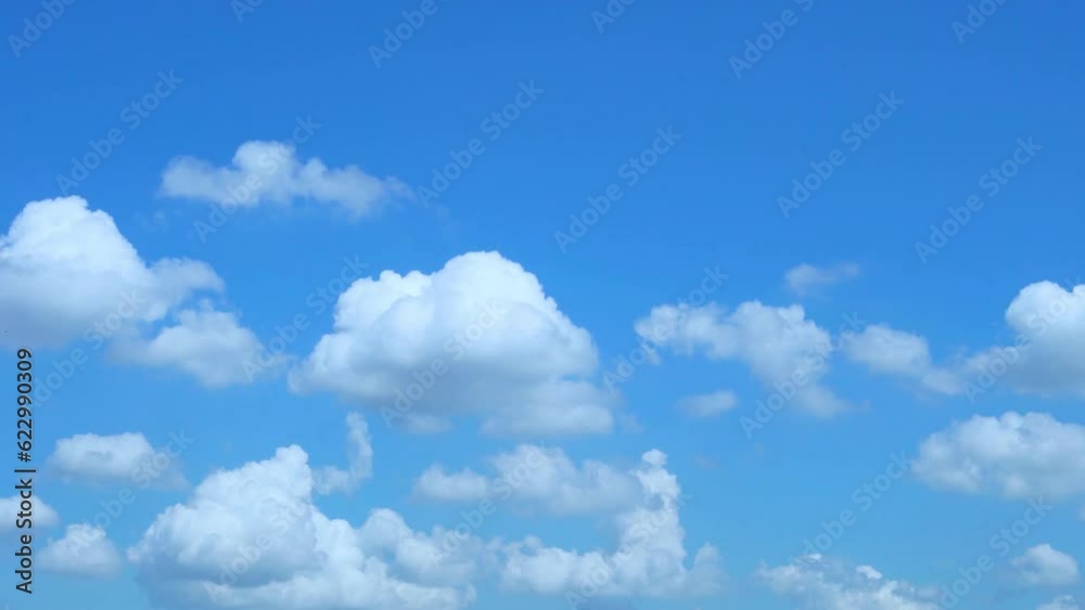 Soaring Puffy White Clouds and Blue Clear Sky on a Sunny Clear Day, Slow Motion, Time Lapse. Summer Cloudy Blue Skyscraper, Atmosphere, Environment, Good Weather, Beautiful Background 4K. Soaring Puffy White Clouds and Blue Clear Sky on a Sunny Clear Day, Slow Motion, Time Lapse. Summer Cloudy Blue Skyscraper, Atmosphere, Environment, Good Weather, Beautiful Background 4K.
