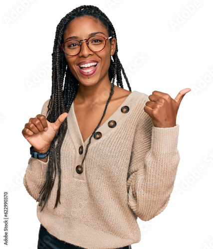 Fotografie African american woman wearing casual clothes pointing to the back behind with h