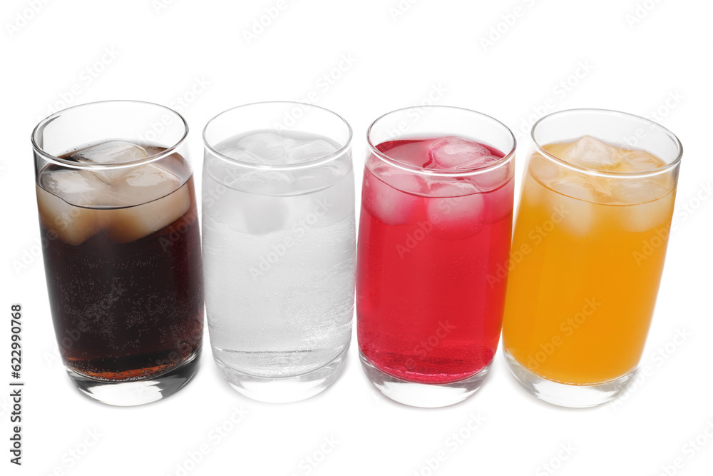 Glasses of different refreshing soda water with ice cubes on white background Glasses of different refreshing soda water with ice cubes on white background