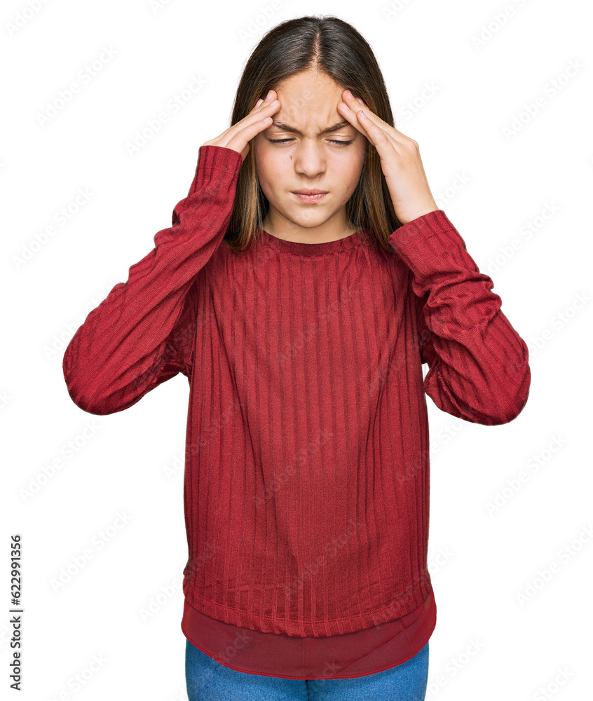 Beautiful brunette little girl wearing casual sweater with hand on head for pain in head because stress. suffering migraine. Beautiful brunette little girl wearing casual sweater with hand on head for pain in head because stress. suffering migraine.