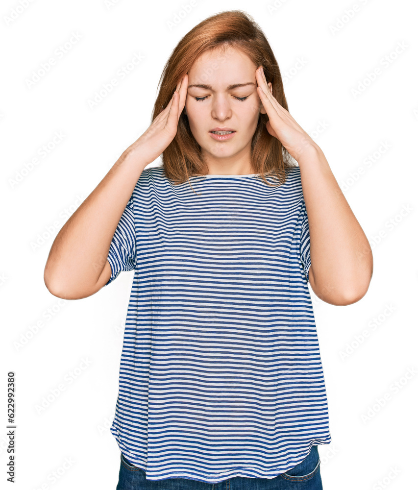 Young caucasian woman wearing casual clothes with hand on head for pain in head because stress. suffering migraine. Young caucasian woman wearing casual clothes with hand on head for pain in head because stress. suffering migraine.