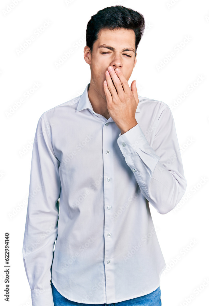 Young hispanic business man wearing business clothes bored yawning tired covering mouth with hand. restless and sleepiness. Young hispanic business man wearing business clothes bored yawning tired covering mouth with hand. restless and sleepiness.