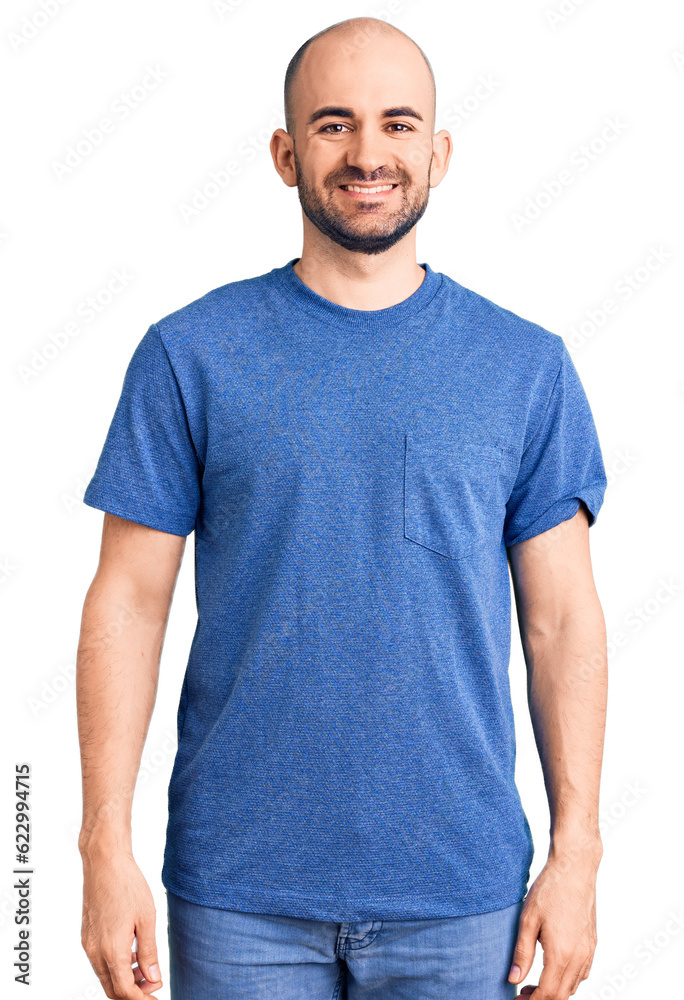 Young handsome man wearing casual t shirt with a happy and cool smile on face. lucky person. Young handsome man wearing casual t shirt with a happy and cool smile on face. lucky person.