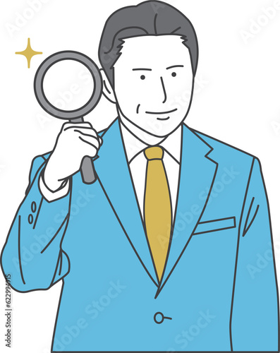 A man in a suit with a magnifying glass