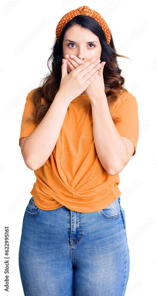 Beautiful young brunette woman wearing casual clothes shocked covering mouth with hands for mistake. secret concept. Beautiful young brunette woman wearing casual clothes shocked covering mouth with hands for mistake. secret concept.