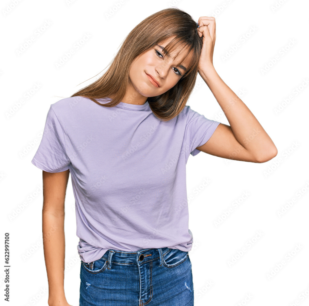 Teenager caucasian girl wearing casual clothes confuse and wonder about question. uncertain with doubt, thinking with hand on head. pensive concept. Teenager caucasian girl wearing casual clothes confuse and wonder about question. uncertain with doubt, thinking with hand on head. pensive concept.