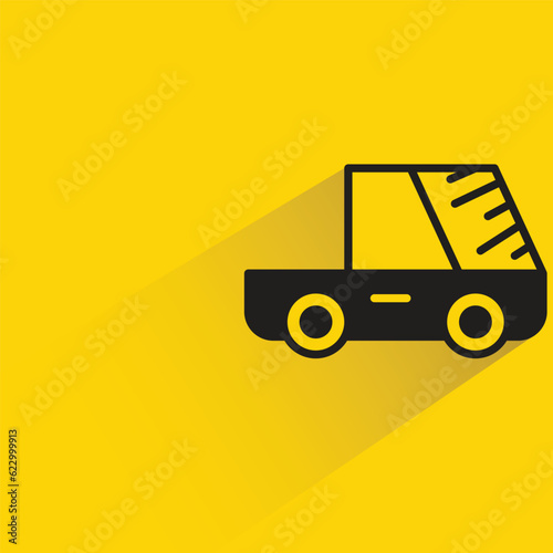 pickup truck with shadow on yellow background