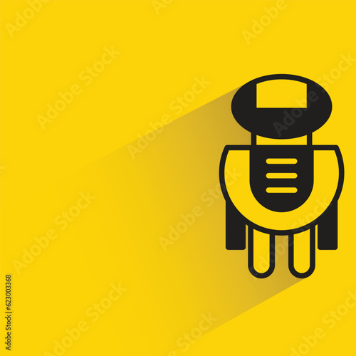 cute robot with shadow on yellow background