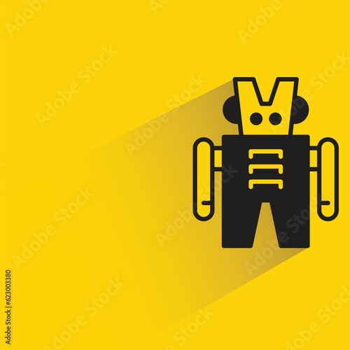 cute robot with shadow on yellow background