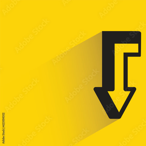 turn down arrow symbol with shadow on yellow background