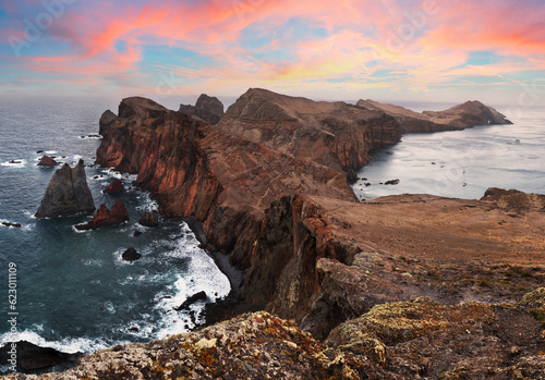 Nice ocean landscape - Dramatic sunrise over colorful cliffs of Ponta de Sao Lourenco in Madeira Island, Portugal.