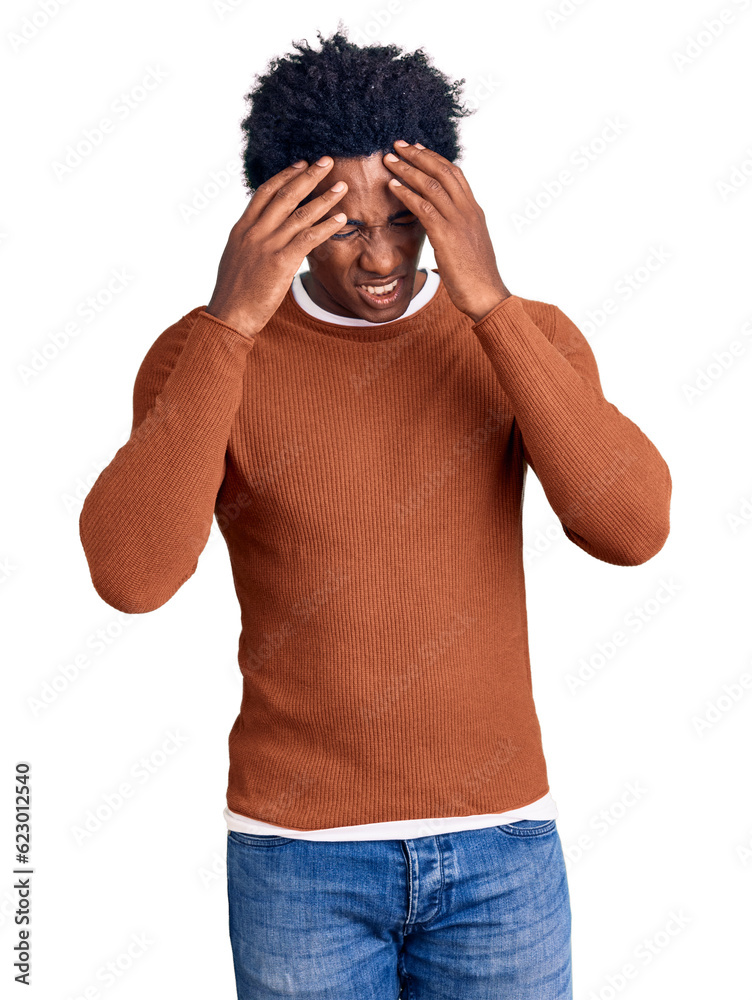 Fototapeta premium Handsome african american man with afro hair wearing casual clothes with hand on head for pain in head because stress. suffering migraine.