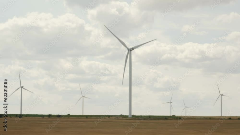 Working wind turbines, windmills. Windpark in Ukraine. Green energy concept Working wind turbines, windmills. Windpark in Ukraine. Green energy concept
