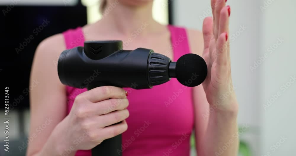 Massage gun restorative therapy and hand stimulation. Hand massage