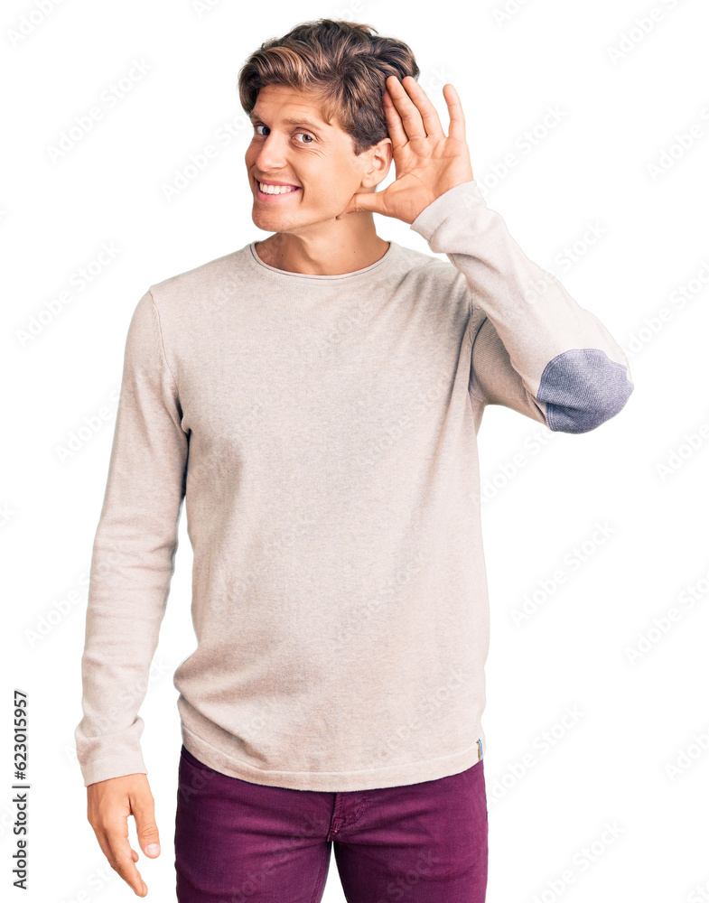 Young handsome man wearing casual clothes smiling with hand over ear listening an hearing to rumor or gossip. deafness concept. Young handsome man wearing casual clothes smiling with hand over ear listening an hearing to rumor or gossip. deafness concept.