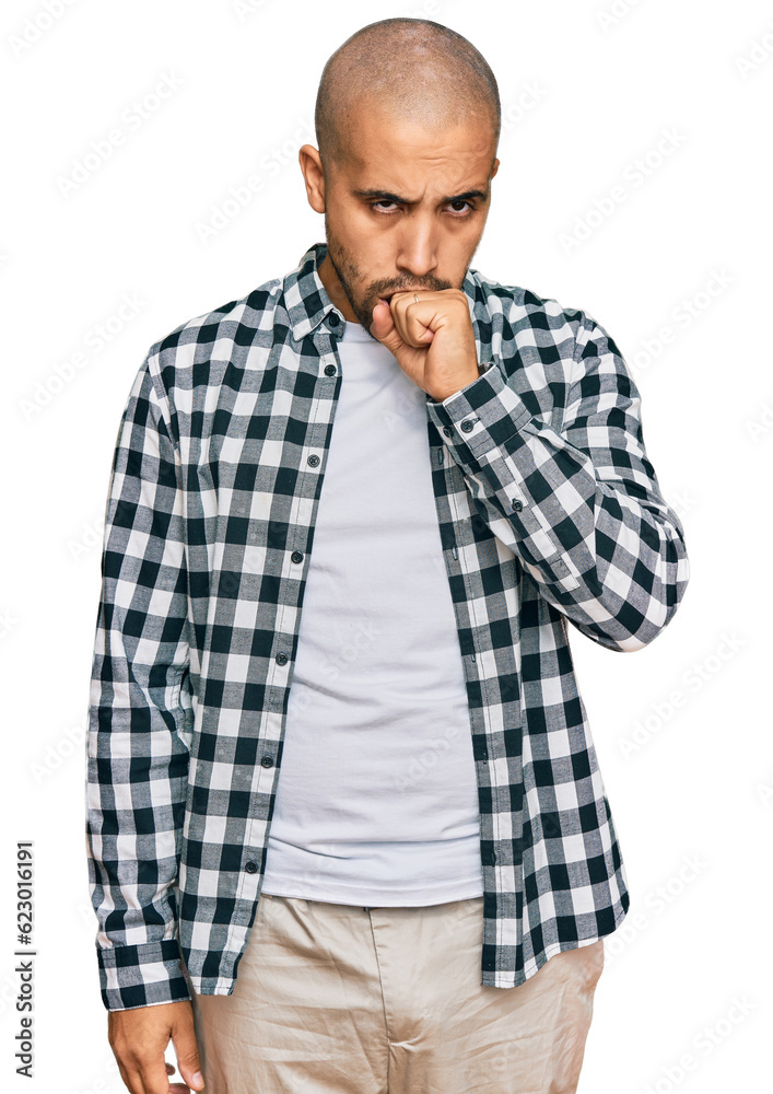 Hispanic adult man wearing casual clothes feeling unwell and coughing as symptom for cold or bronchitis. health care concept. Hispanic adult man wearing casual clothes feeling unwell and coughing as symptom for cold or bronchitis. health care concept.