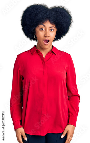 Young african american girl wearing casual clothes afraid and shocked with surprise and amazed expression, fear and excited face.