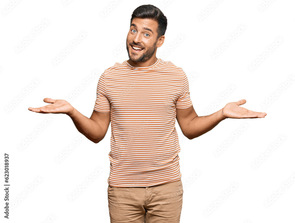 Handsome hispanic man wearing casual clothes smiling showing both hands open palms, presenting and advertising comparison and balance