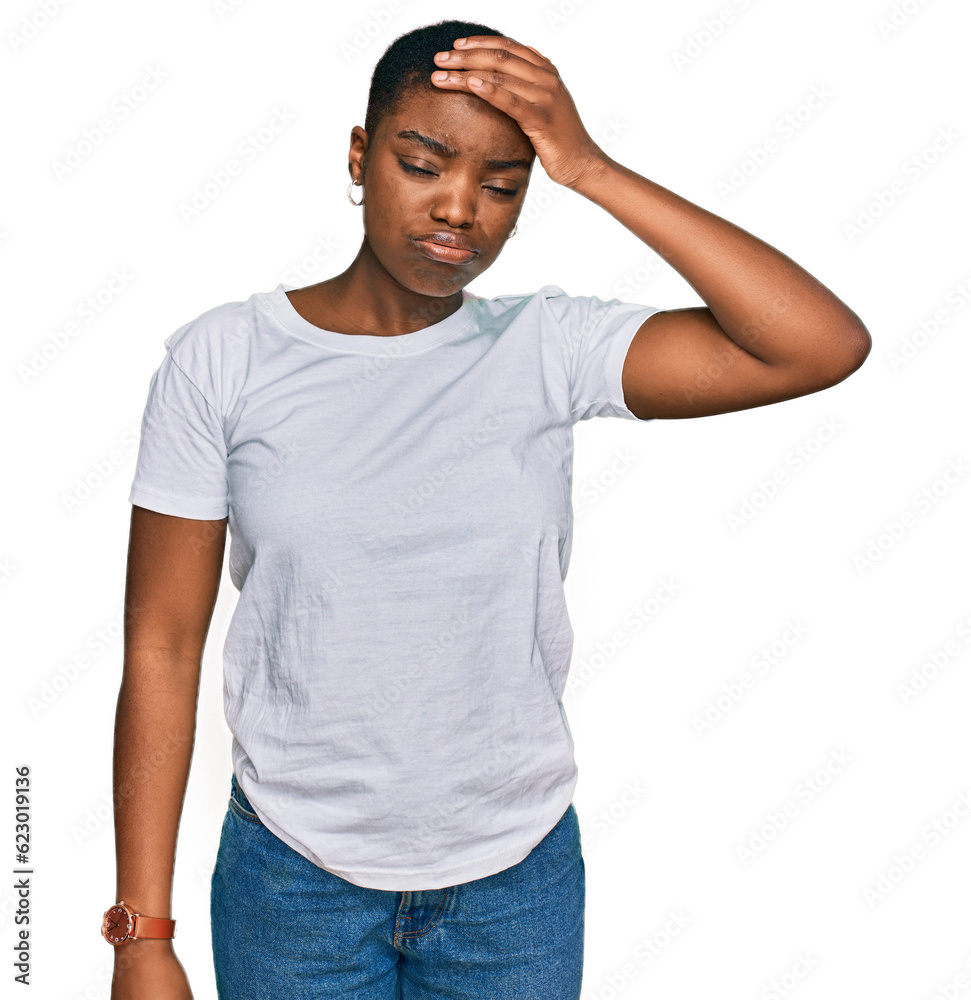 Young african american woman wearing casual white t shirt worried and stressed about a problem with hand on forehead, nervous and anxious for crisis Young african american woman wearing casual white t shirt worried and stressed about a problem with hand on forehead, nervous and anxious for crisis
