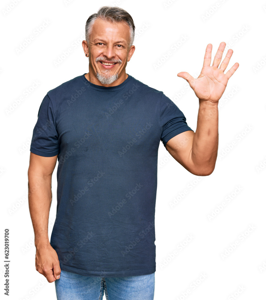 Middle age grey-haired man wearing casual clothes showing and pointing up with fingers number five while smiling confident and happy. Middle age grey-haired man wearing casual clothes showing and pointing up with fingers number five while smiling confident and happy.