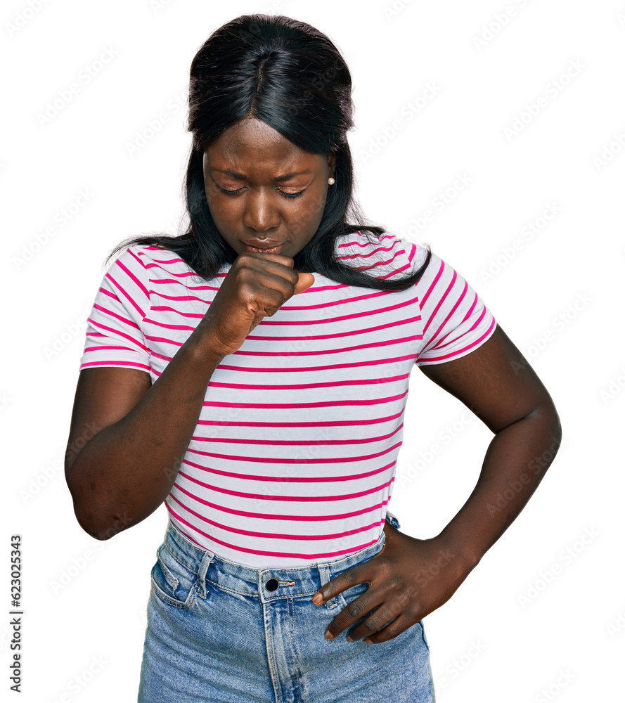 African young woman wearing casual striped t shirt feeling unwell and coughing as symptom for cold or bronchitis. health care concept. African young woman wearing casual striped t shirt feeling unwell and coughing as symptom for cold or bronchitis. health care concept.