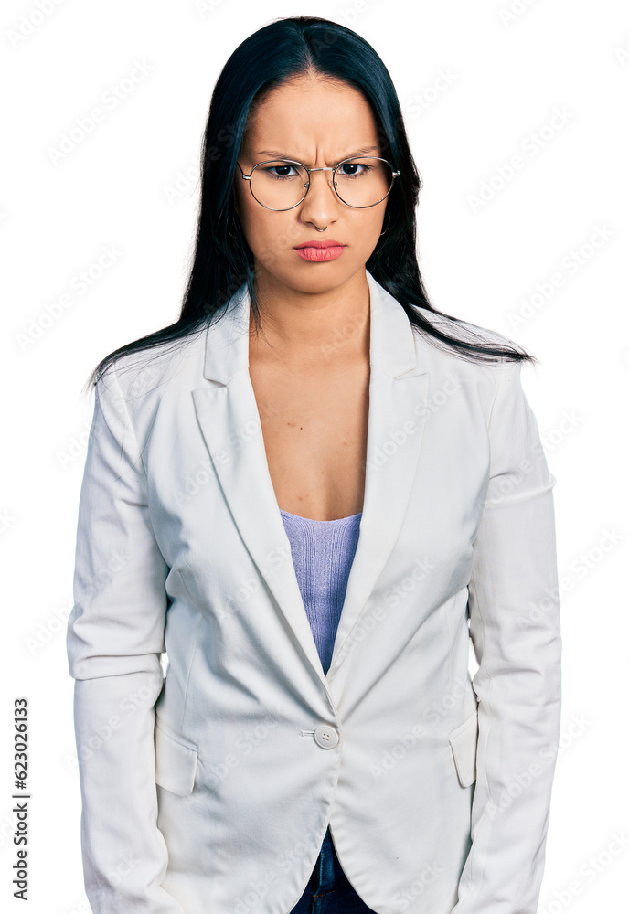 Beautiful hispanic woman with nose piercing wearing business jacket and glasses skeptic and nervous, frowning upset because of problem. negative person. Beautiful hispanic woman with nose piercing wearing business jacket and glasses skeptic and nervous, frowning upset because of problem. negative person.