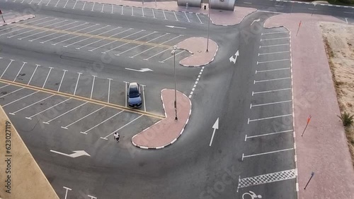 Areal footage of the parking lot in one of the suburbs of the city. Urban