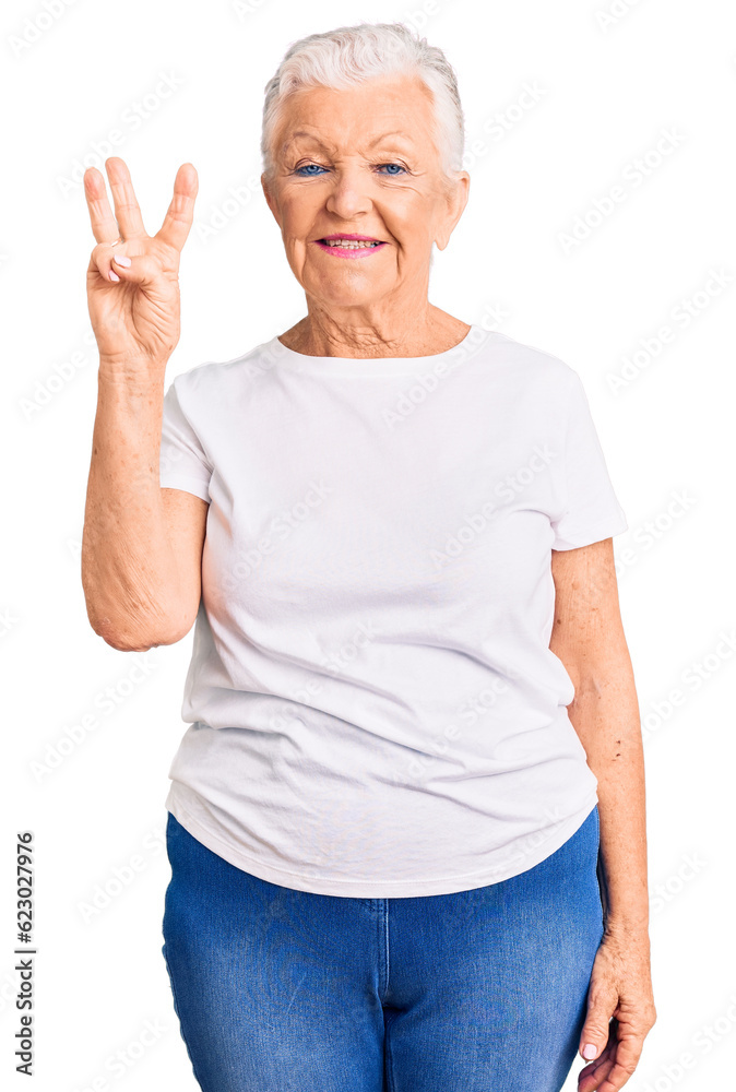 Senior beautiful woman with blue eyes and grey hair wearing casual white tshirt showing and pointing up with fingers number three while smiling confident and happy. Senior beautiful woman with blue eyes and grey hair wearing casual white tshirt showing and pointing up with fingers number three while smiling confident and happy.