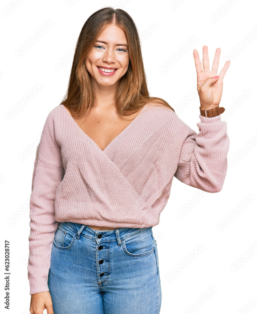 Beautiful blonde woman wearing casual winter pink sweater showing and pointing up with fingers number four while smiling confident and happy.