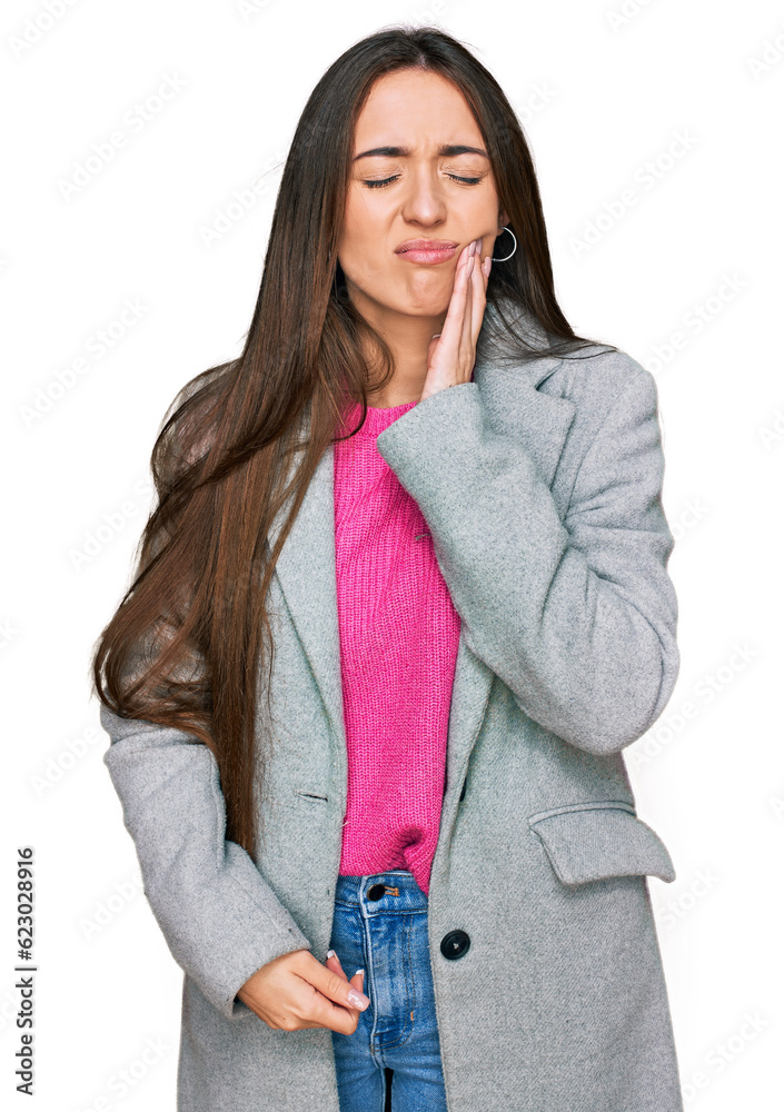 Young hispanic girl wearing business clothes touching mouth with hand with painful expression because of toothache or dental illness on teeth. dentist Young hispanic girl wearing business clothes touching mouth with hand with painful expression because of toothache or dental illness on teeth. dentist