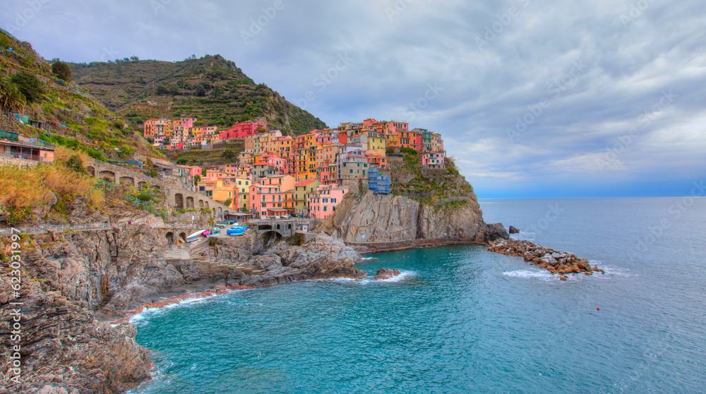 Beautiful colorful cityscape on the mountains over Mediterranean sea - Cinque Terre, italy