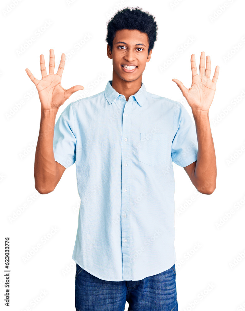 Young african american man wearing casual clothes showing and pointing up with fingers number ten while smiling confident and happy. Young african american man wearing casual clothes showing and pointing up with fingers number ten while smiling confident and happy.