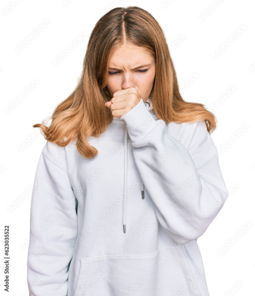 Beautiful young caucasian girl wearing casual sweatshirt feeling unwell and coughing as symptom for cold or bronchitis. health care concept. Beautiful young caucasian girl wearing casual sweatshirt feeling unwell and coughing as symptom for cold or bronchitis. health care concept.